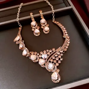 Luxury French vintage rhinestone jewelry set with gold necklace and teardrop earrings