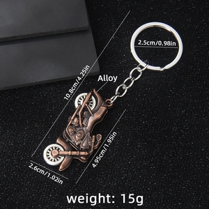 Vintage copper alloy motorcycle keychain with silver wheels and clear dimension markings