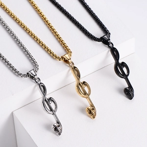 Detailed view of skull music note pendants in silver, gold, and black steel
