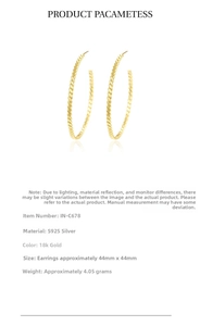 Detail view of large 44mm twisted spiral hoop earrings in 18k gold plated S925 silver