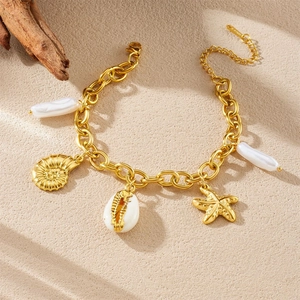 Marine style stainless steel bracelet with starfish pendants and baroque pearls on sand