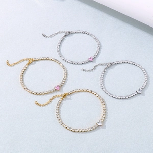 Luxe heart-shaped zircon bracelet in gold and silver finish with pink and white stones