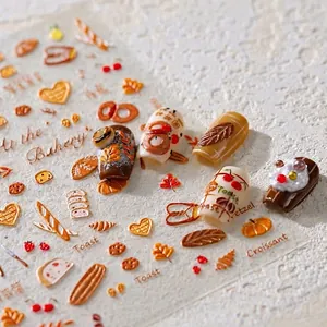 Autocollants 3D pour ongles thème pâtisserie d'automne avec citrouilles et toasts