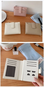 Short PU leather and canvas women's wallet with multiple card slots and snap closure