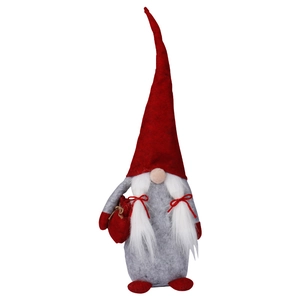 Stehende weihnachtliche gesichtslose Zwergenpuppe mit roter Mütze und weißen Zöpfen