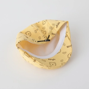 Detail view of yellow baby sun hat with bear print and adjustable chin strap