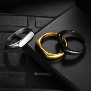 Minimalist titanium steel signet rings for women and men in silver, gold, and black colors