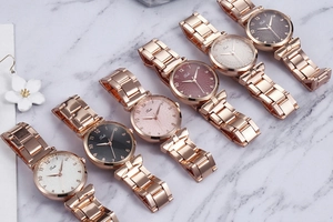 Collection of women's quartz watches with rose gold straps and colorful round dials