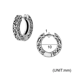 Detail view of vintage silver hoop earring with intricate vine carving and size measurements