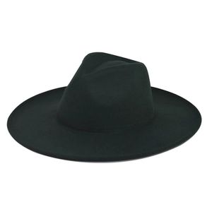 Macro view of thick black wool felt fedora with a smooth crown and wide flat brim