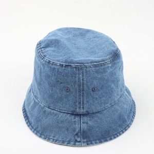 Detail view of deep blue denim bucket hat with durable multi-row stitching and air vents