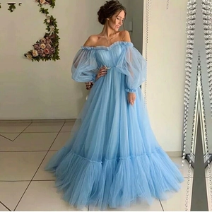 Elegant light blue off-shoulder tulle wedding gown with puff sleeves and layered skirt