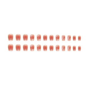 Pink gradient French press-on nails with floral and bow designs, 24-piece set in short coffin shape