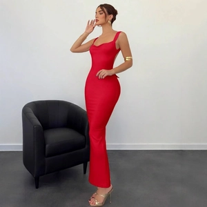 Detailed view of red backless slim-fit maxi dress with bow design and side slit