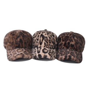 Faux fox fur baseball caps with leopard print patterns in three warm color tones