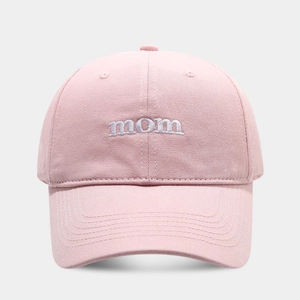 Close-up of MOM white embroidery on soft pink cotton twill baseball cap with stitching