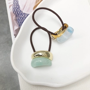 Elegant U-shape hair tie with high-elastic brown band and gold resin mosaic accents
