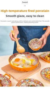 Detail of bohemian ceramic tableware set with colorful mandala patterns and wooden tray