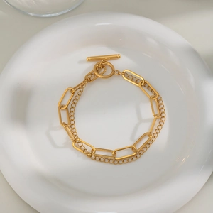 Double-layered 18K gold plated chain bracelet with a vintage T-bar toggle clasp design