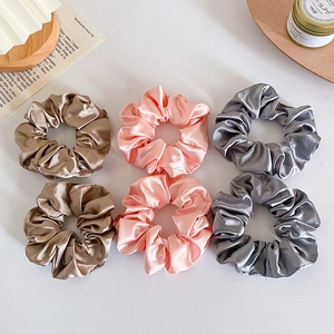 6-piece set of satin floral and leopard hair scrunchies in champagne, pink, and gray