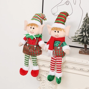 Pair of Christmas elf dolls with long legs in red and green plaid outfits for decor