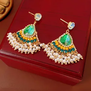 Vintage bohemian fan-shaped earrings with green crystals and white pearl tassels