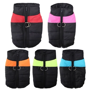 Detail of five colorful winter pet vests with metal D-rings and quilted windproof fabric