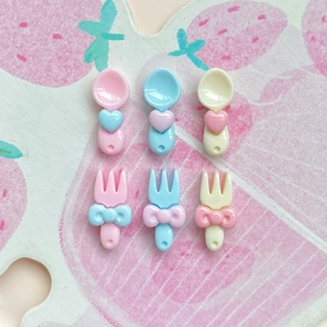 Cute pink blue and yellow mini resin spoon and fork set with heart and bow details