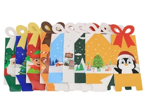 Detail view of large Christmas gift boxes with festive patterns and butterfly-shaped handles