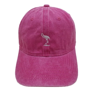 Faded red washed cotton baseball cap featuring white bird embroidery and six-panel crown