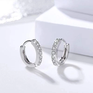 Classic S925 sterling silver huggie earrings with sparkling row-set cubic zirconia stones