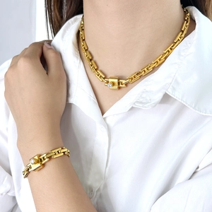 Golden titanium steel chunky chain jewelry set with crystal-encrusted square buckle