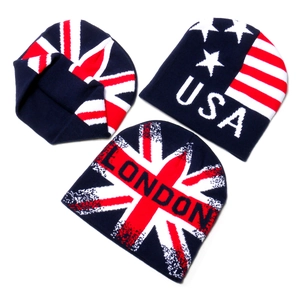 Detailed flat lay of USA and London flag jacquard knit beanies in red, white and blue