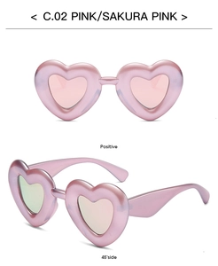 Front and 45-degree angle view of pink heart-shaped polarized sunglasses for women