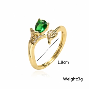 Detail of gold plated ring with emerald green teardrop stone and 1.8cm inner diameter