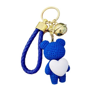 Creative blue woven texture bear keychain with white heart and braided leather strap