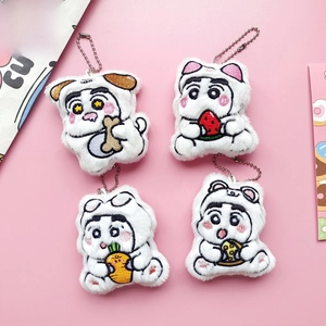 Detail of four embroidered plush pendants with animal costumes and silver ball chains