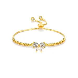 Adjustable gold bolo bracelet with sparkling cubic zirconia butterfly charm for women