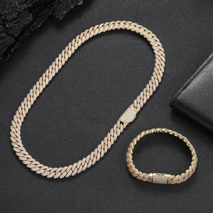 Close-up of 10mm double-row zircon iced-out gold Cuban link bracelet and necklace set