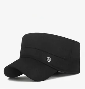 Close-up of black winter cadet hat featuring a silver SP metal badge and thick twill fabric