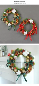 Close-up of Christmas wreath with pine cones, cotton, golden balls and cinnamon sticks