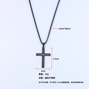 Detail view of black stainless steel cross pendant with 3mm square box chain necklace