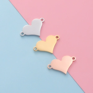 Polished stainless steel heart-shaped connectors in silver, gold, and rose gold for DIY jewelry