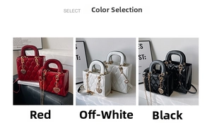 Close-up of quilted patent leather handbags in red, beige and black with heart charms