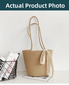 Detail view of khaki woven cotton rope bucket bag with delicate lace ribbon decoration