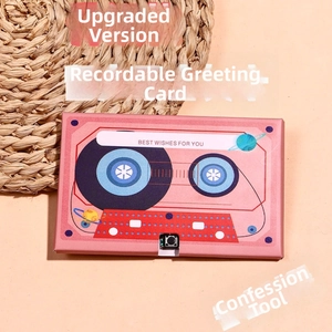 Detail of retro tape-shaped voice greeting card with pink design and record buttons