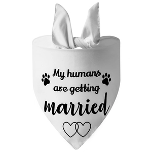 Close-up of a white wedding dog bandana with My humans are getting married text