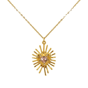 Collier en acier doré avec pendentif cœur rayonnant orné d'une pierre de zircon rose