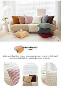 Detailed view of puff waffle texture fabric on soft minimalist cream style throw pillows