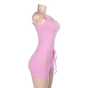 Detail view of pink ribbed knit camisole and drawstring shorts set on a mannequin